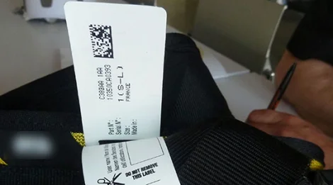 Exemple d'étiquette d'identification adhésive sur harnais Petzl